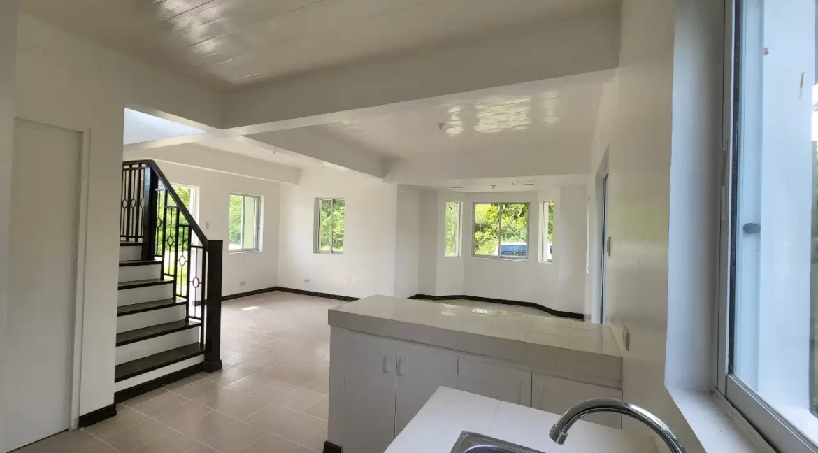 Emerald-Living-Room-Kitchen-Stairs